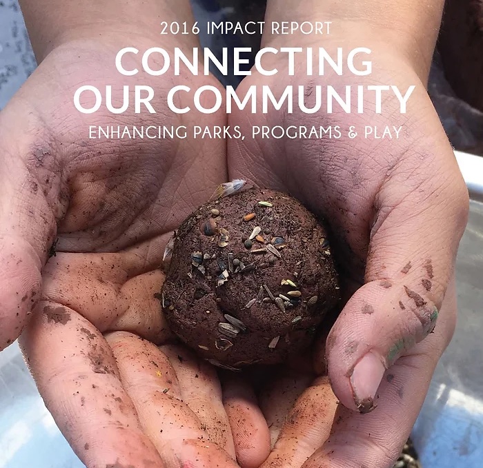 hands holding a ball of mud