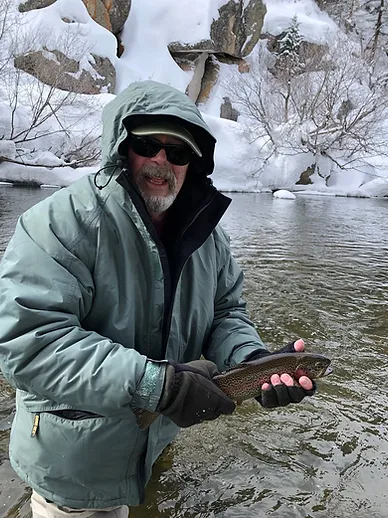 bill with a fish at a pond