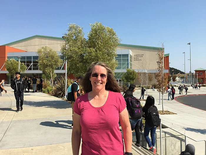 woman smiling outside