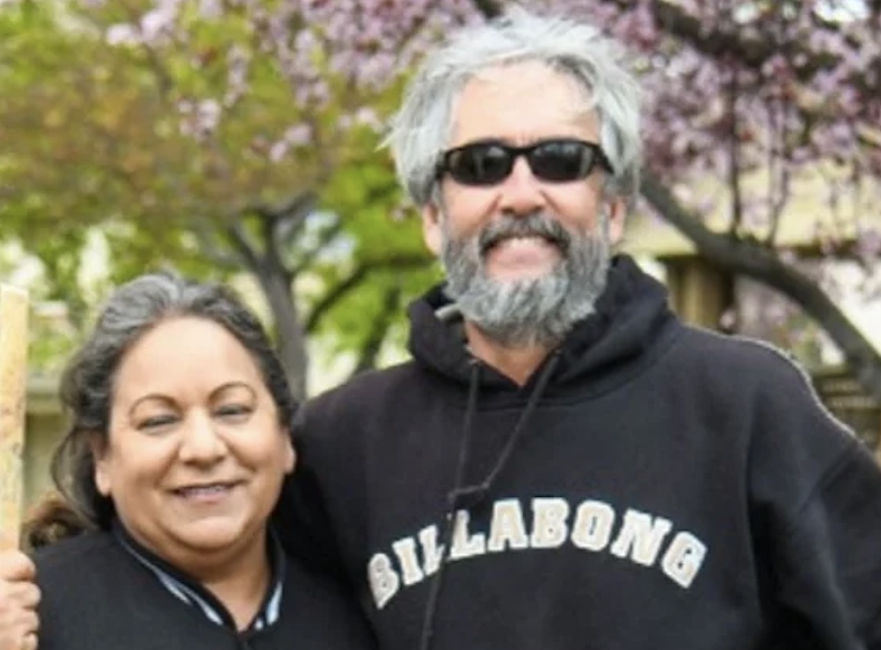 man and woman smiling