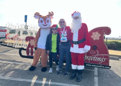 Santa and Rudolph with two participants