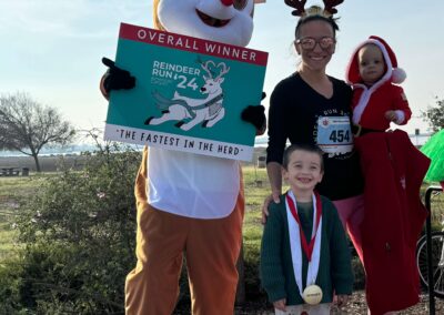Race Winner with Rudolph and young Children