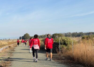 Walkers on the race trail, image from behind