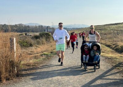Family running with a stroller