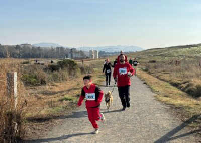 family running with child
