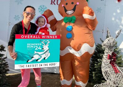 Race winner with baby and Gingerbread man